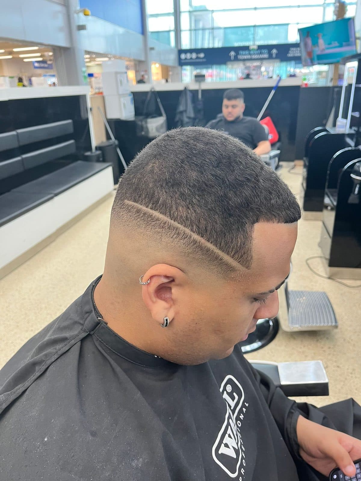 Close detail of a blended fade finished at the neckline